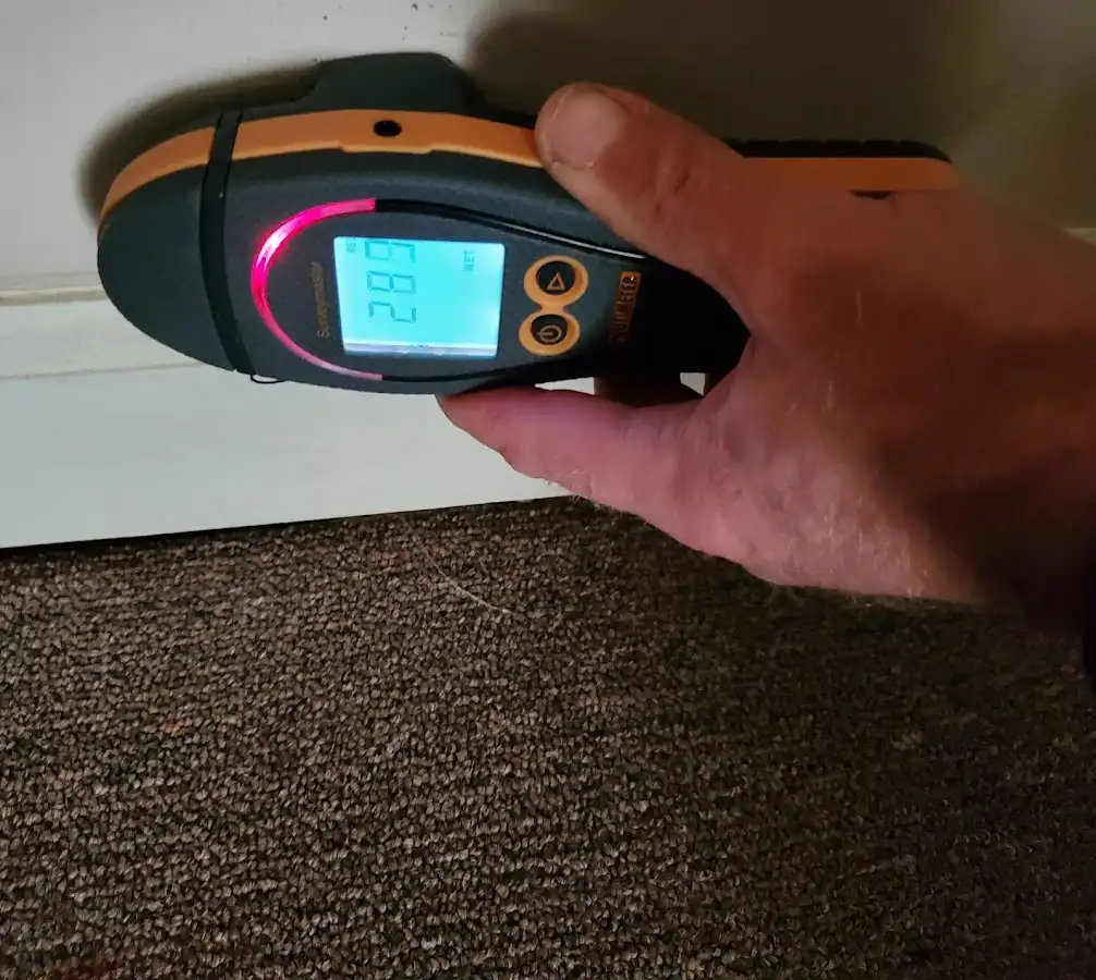 Moisture detection at baseboard during Burst Pipe Cleanup in Robbinsville